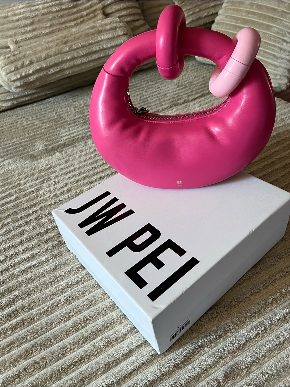 JW PEI pink crescent bag with loop handle